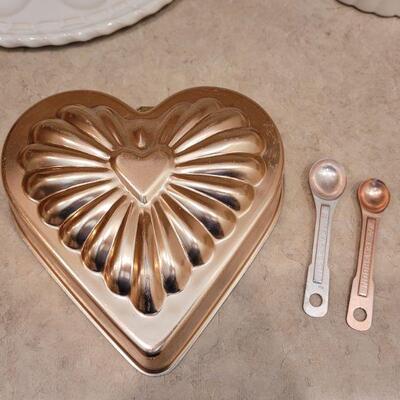 Lot 41: Rose Copper Heart Mold & 2 Measuring Spoons, Hallmark Egg Dish, and Serving Dish