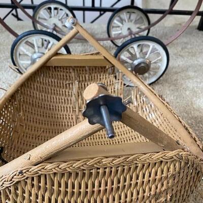 Lot 750 - Vintage Wicker baby Buggy