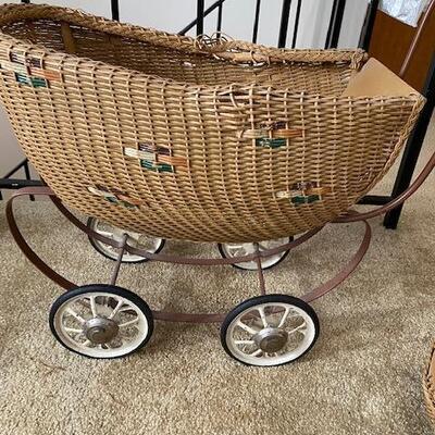 Lot 750 - Vintage Wicker baby Buggy