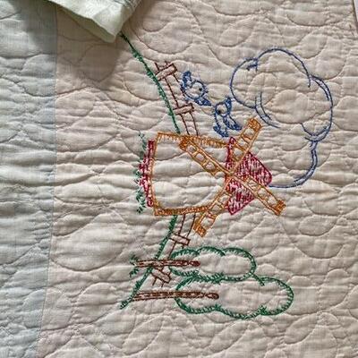 Lot 781 - Vintage hand embroidered baby quilt