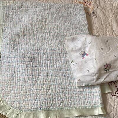 Lot 781 - Vintage hand embroidered baby quilt