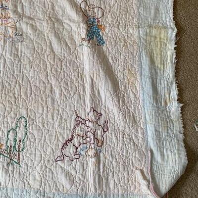 Lot 781 - Vintage hand embroidered baby quilt