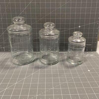 3 glass canisters