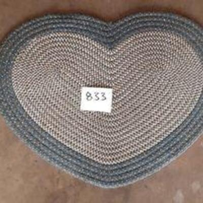 Lot 833 - Heart shaped braided rug