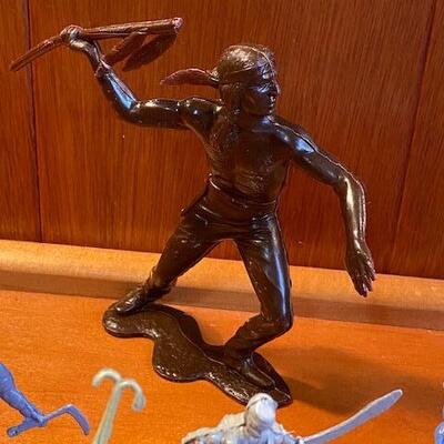 Lot 897 -  Vintage cowboys and Indians and other figures