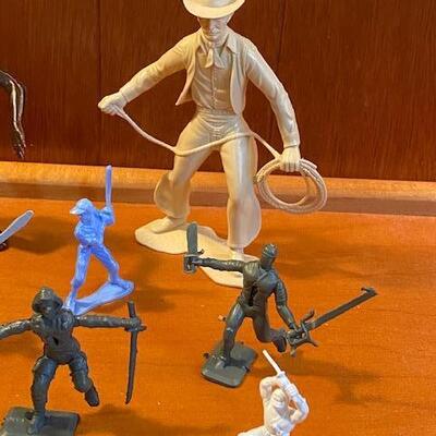 Lot 897 -  Vintage cowboys and Indians and other figures
