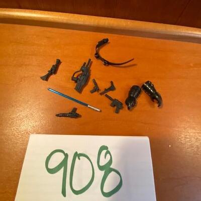 Lot 908 - Action figure accessories