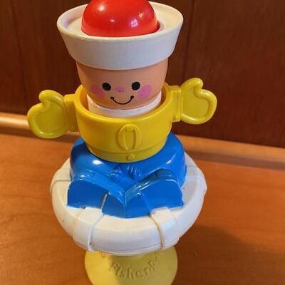 Lot 931 - Vintage Fisher Price Squeak and Peek Sailor Baby toy