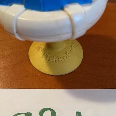 Lot 931 - Vintage Fisher Price Squeak and Peek Sailor Baby toy