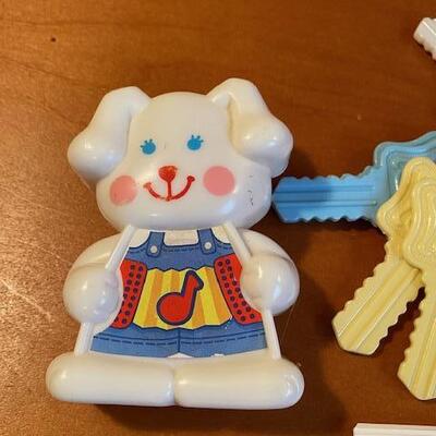 Lot 933 - Vintage baby toys, rattles and keys