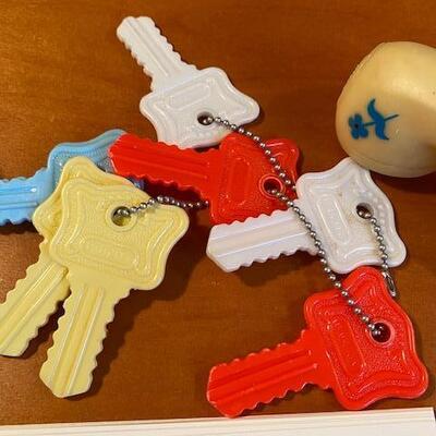 Lot 933 - Vintage baby toys, rattles and keys