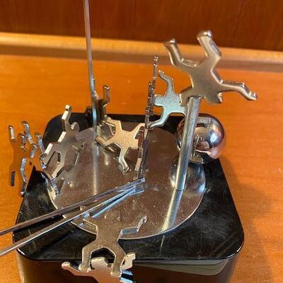 Lot 940 - Magnetic Art, poles and people