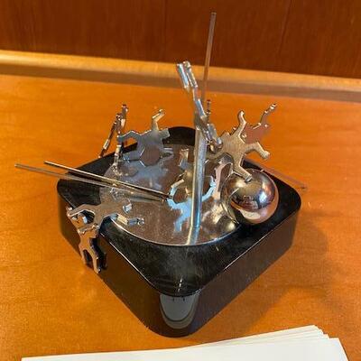 Lot 940 - Magnetic Art, poles and people