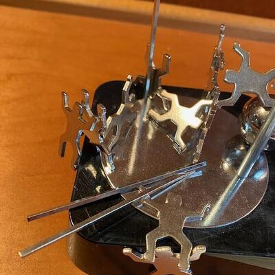 Lot 940 - Magnetic Art, poles and people