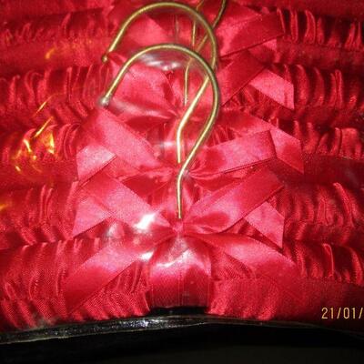 Lot 12 - Package of Red Satin Padded Hangers