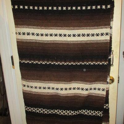 Lot 119 - Brown and Black Southwestern Style Wood Blanket