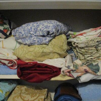 Lot 120 - Two Shelves of Linens LOCAL PICKUP ONLY