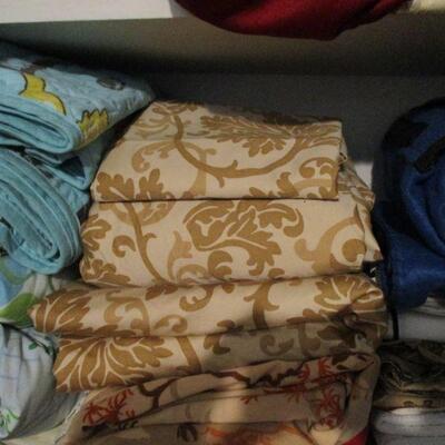 Lot 120 - Two Shelves of Linens LOCAL PICKUP ONLY