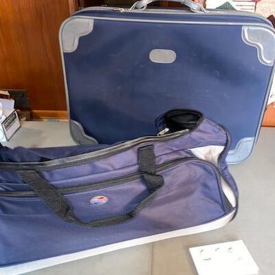Lot 975 - American Tourister Luggage