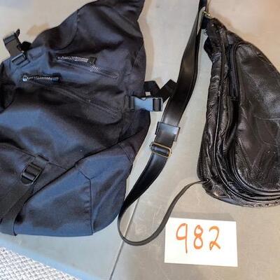 Lot 983 - sling backpacks