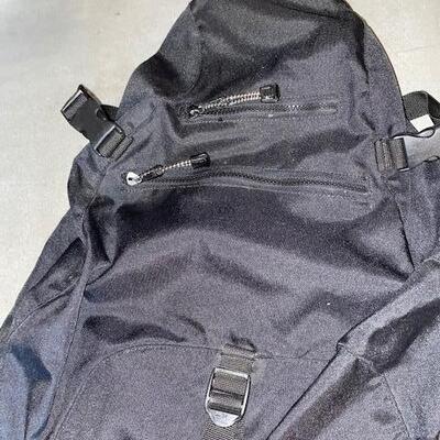 Lot 983 - sling backpacks