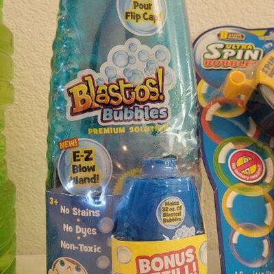 Lot 197: New BUBBLE Fluid Large Refills + Toy