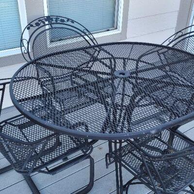 Lot 221: Outdoor Patio Set w/ (4) Rocking Chairs