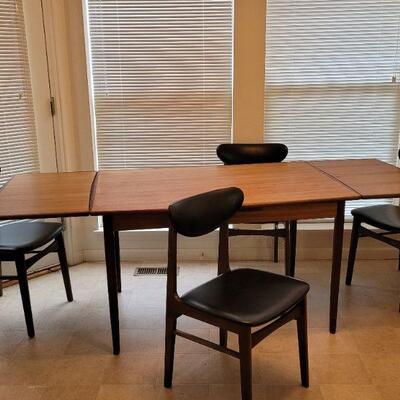 Lot 238: Vintage Mid Century Modern MADE IN DENMARK Dining Table + (4) Made in Yugoslavia Dining Chairs