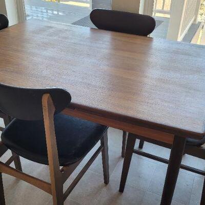Lot 238: Vintage Mid Century Modern MADE IN DENMARK Dining Table + (4) Made in Yugoslavia Dining Chairs