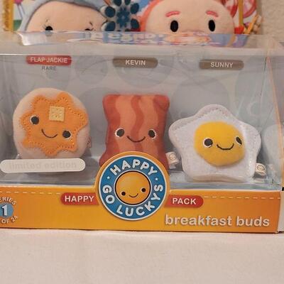 Lot 264: New Candy Land Book & Itty Bittys and (3) Happy Go Luckys Happy Packs