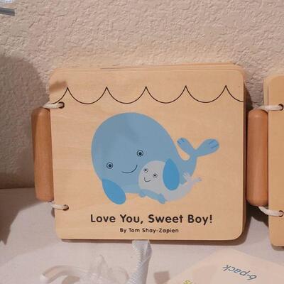 Lot 269: NEW Baby Boy Books, Bib, Washcloths, Bottle Tote and Snuggle Blanket Bear