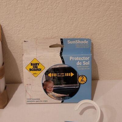 Lot 282: NEW Baby Boy Bibs, Toy, Plushie, Utensils and Window Shade