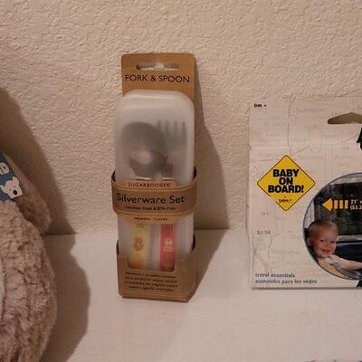 Lot 282: NEW Baby Boy Bibs, Toy, Plushie, Utensils and Window Shade