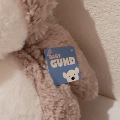 Lot 282: NEW Baby Boy Bibs, Toy, Plushie, Utensils and Window Shade