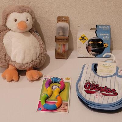 Lot 282: NEW Baby Boy Bibs, Toy, Plushie, Utensils and Window Shade