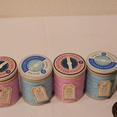 Lot 286: New (4) Small Spool Candles and Spool Deco Hangers