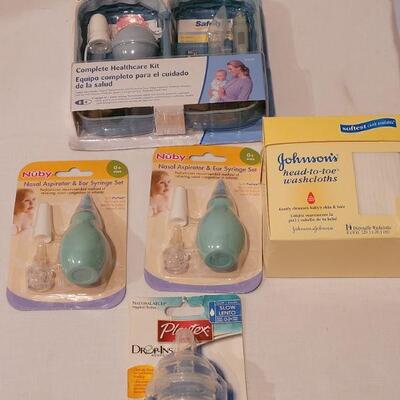 Lot 300: NEW Baby Boy Basket, Elephant Plushie ect.