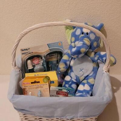 Lot 300: NEW Baby Boy Basket, Elephant Plushie ect.