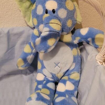 Lot 300: NEW Baby Boy Basket, Elephant Plushie ect.