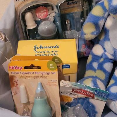Lot 300: NEW Baby Boy Basket, Elephant Plushie ect.