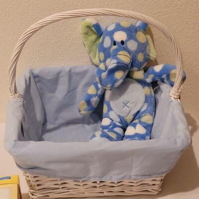 Lot 300: NEW Baby Boy Basket, Elephant Plushie ect.
