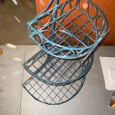 Lot 1005 - Metal tiered shelf
