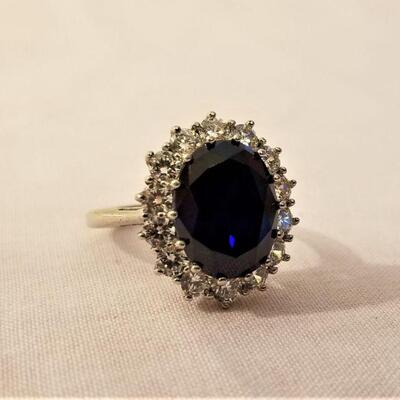 Lot #38  Sterling Silver Ring set with CZs and Faux Sapphire