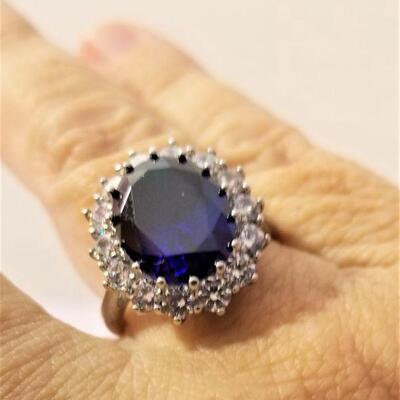 Lot #38  Sterling Silver Ring set with CZs and Faux Sapphire
