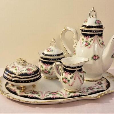 Lot #52  Contemporary Tea set in the Antique Style