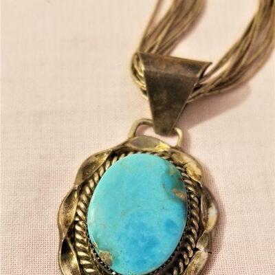 Lot #56  Sterling "Liquid Silver" necklace with Southwest Turquoise Pendant