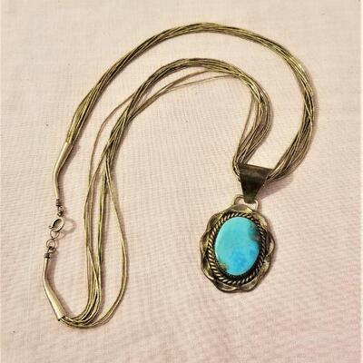 Lot #56  Sterling "Liquid Silver" necklace with Southwest Turquoise Pendant