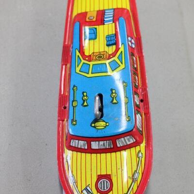 Lot 54 1950's J. Chein 9in Tin Wind Up Boat (works)