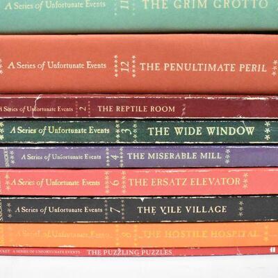 11 Lemony Snicket Books, not a complete set, 1 duplicate