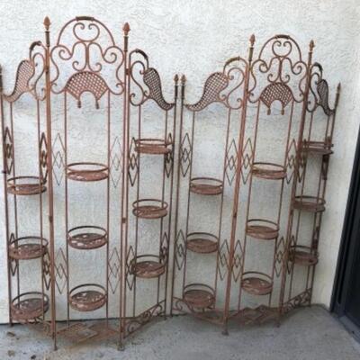 Lot 1. Pair of iron plant stands (77â€ x 40â€)--$250